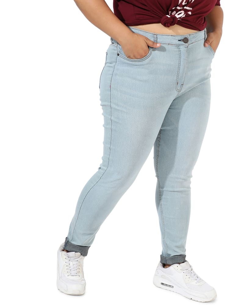 Front of a model wearing a size 40 Light Blue Skinny Jeans in Light Blue by Instafab Plus. | dia_product_style_image_id:297995